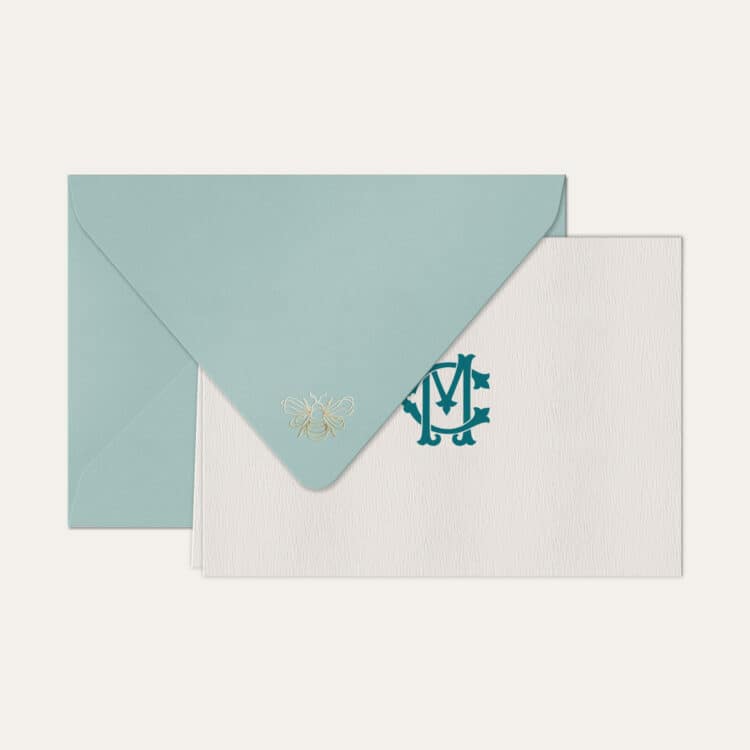 Papel de carta personalizado com monograma clássico em azul petróleo e envelope azul bebe