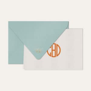 Papel de carta personalizado com monograma gatsby em laranja e envelope azul bebe