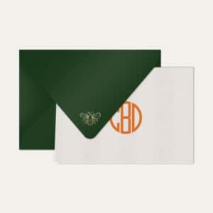 Papel de carta personalizado com monograma gatsby em laranja e envelope verde escuro