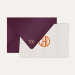 Papel de carta personalizado com monograma gatsby em laranja e envelope vinho